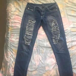 Dark blue ripped jeans